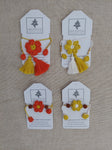 Handknit Rakhi -- Set of 4 Flower Rakhis (Combo-1)